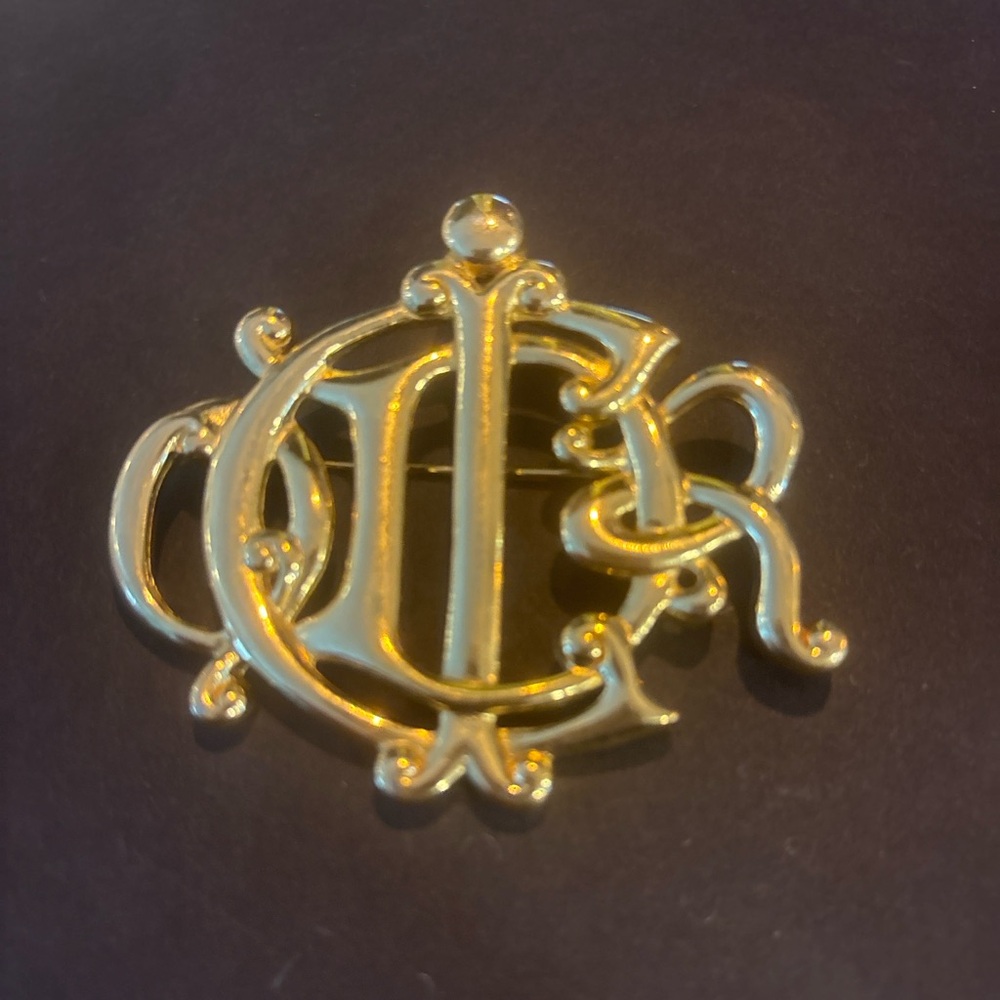 Authentic Christian Dior Gold-Tone
Monogram Brooch